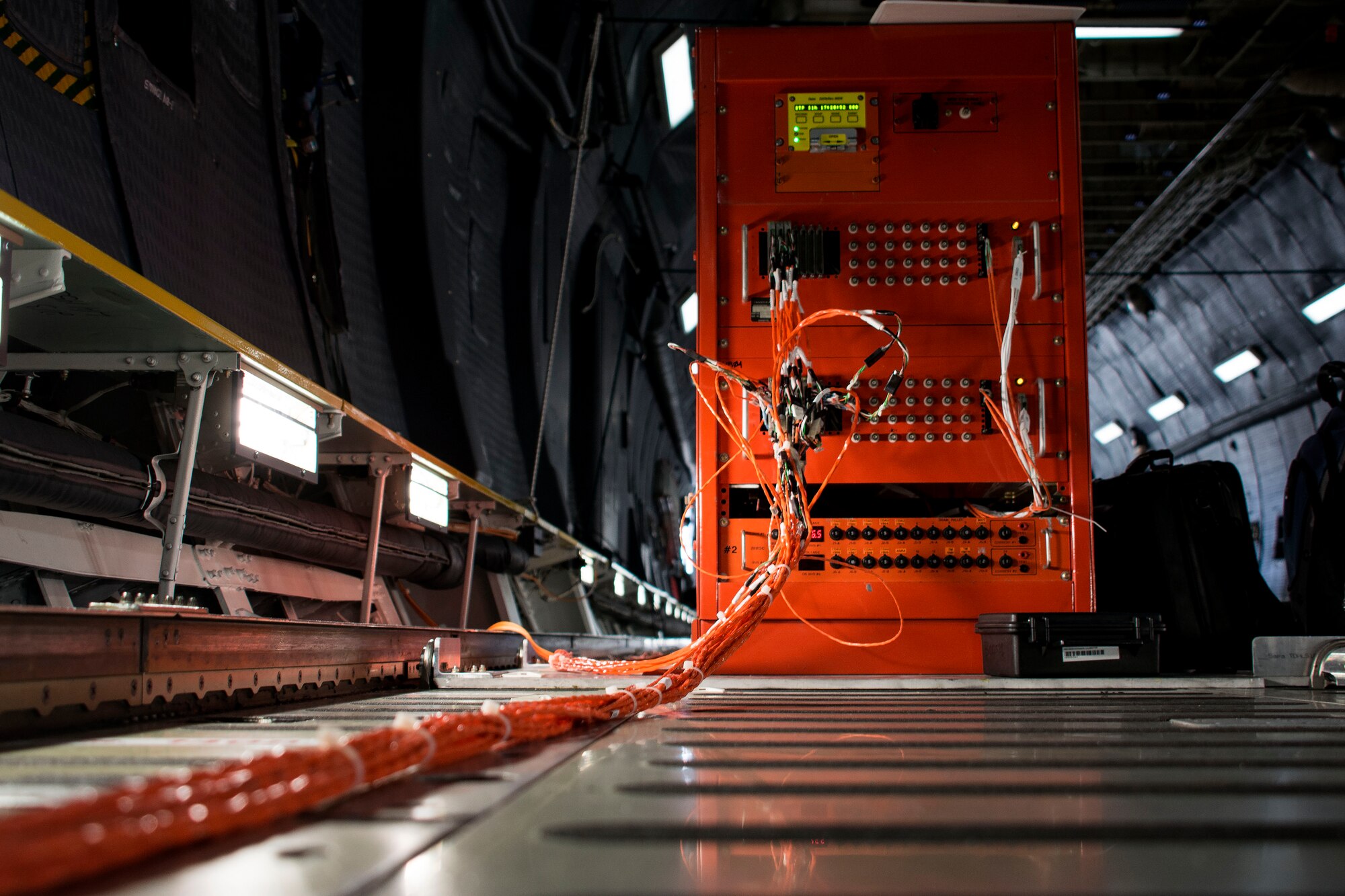 Twelve microphones, five single axis accelerometers and four triaxle accelerometers were mounted in the cargo compartment of a C-5M Super Galaxy to collect interior noise and vibration data during a flight, Sept. 24, 2015, at Travis Air Force Base, California. (U.S. Air Force photo by Senior Airman Charles Rivezzo) 