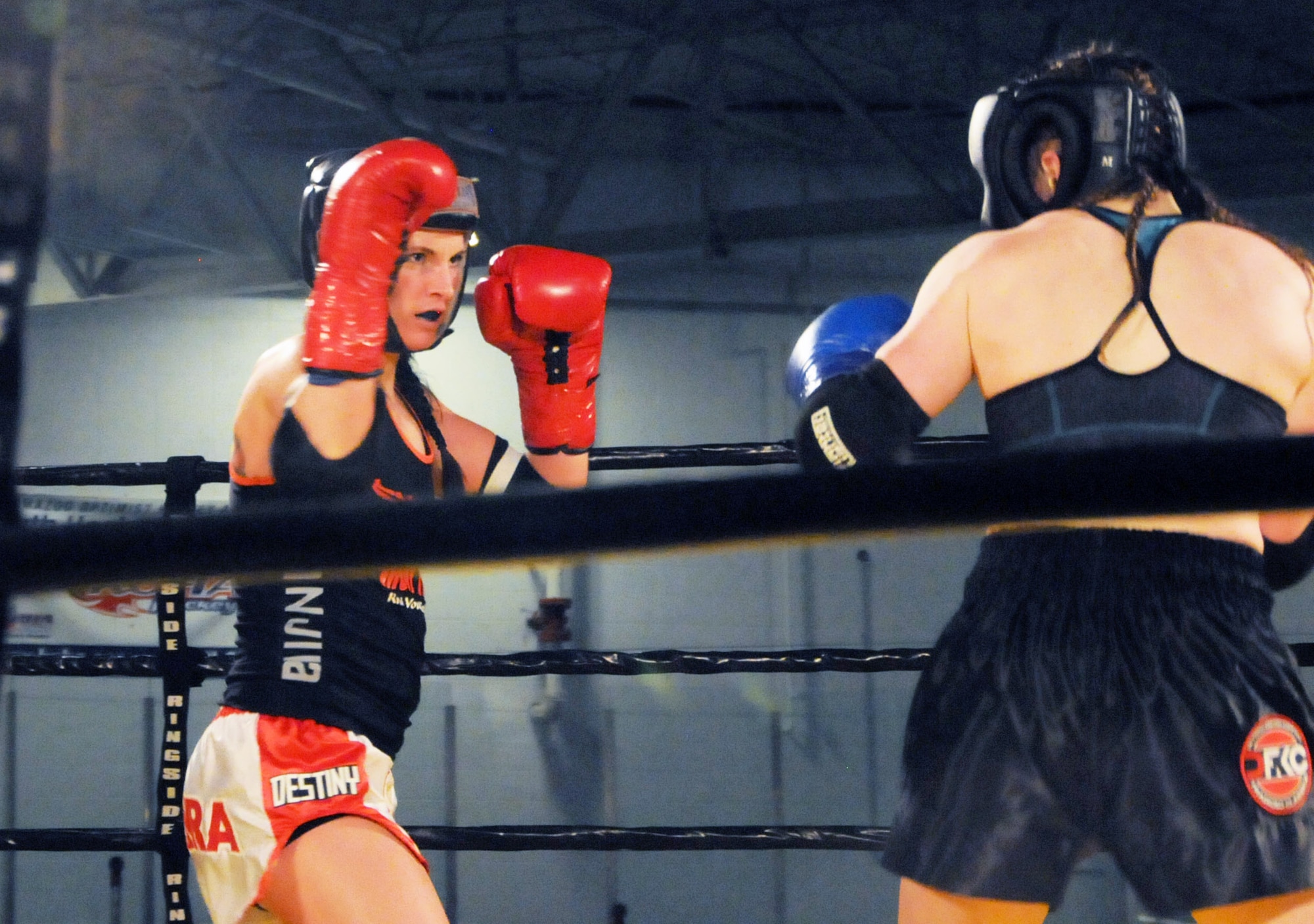 Tech. Sgt. Destiny Taylor, 110th Attack Wing Comptroller Flight claimed victory in her third Muay Thai full contact fight, Saturday, March 7, 2015, Wings Stadium, Kalamazoo Mich. Sgt Taylor has been practicing Muay Thai for two years. (Air National Guard photo by Tech. Sgt. Timothy Diephouse/Released)