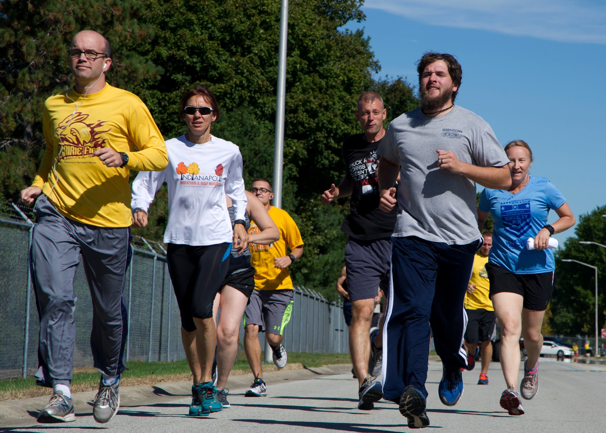 Airmen participate in a Fall Foliage 5K and walk at Grissom Air Reserve Base, Ind., Sept. 30, 2015. Hosted by the 434th Force Support Squadron fitness center, runners ran along Grissom’s perimeter, a 3.1-mile trail. (U.S. Air Force photo/Senior Airman Katrina Heikkinen)