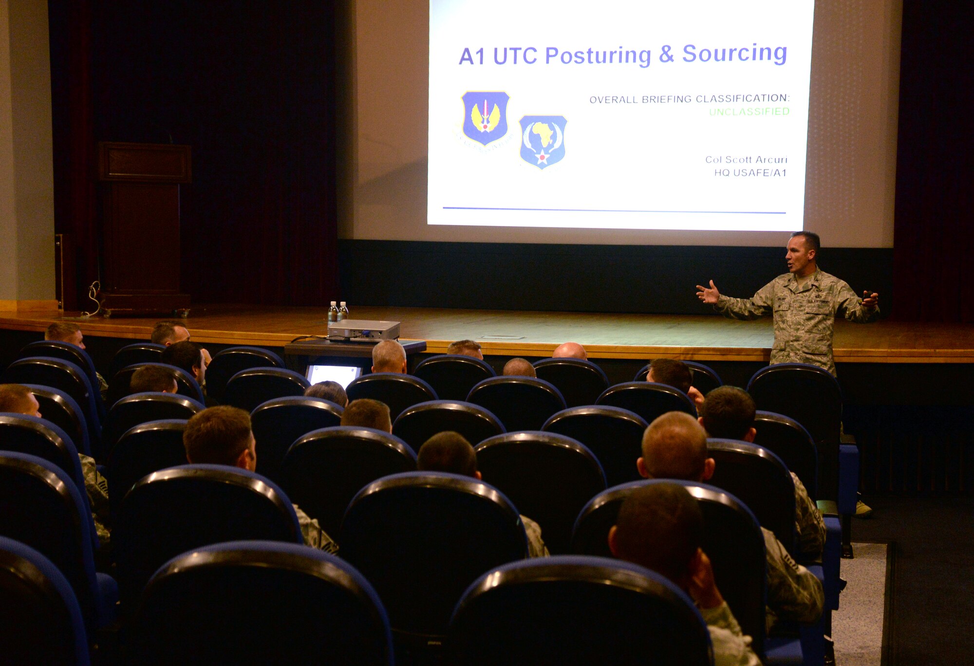 Command Support Staff Airmen from Team Mildenhall listen while other Airmen introduce themselves during a luncheon with U.S. Air Force Col. Scott Arcuri, U.S. Air Forces in Europe and Air Forces Africa director, manpower, personnel, services Oct. 6, 2015, on RAF Mildenhall, England. Arcuri visited the CSS Airmen to answer their questions about day-to-day job issues. (U.S. Air Force photo by Senior Airman Christine Halan/Released)