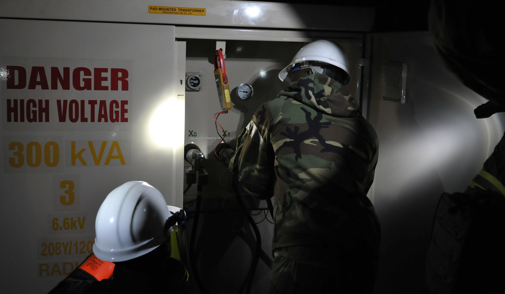 Members from the 8th Civil Engineer Squadron replace a transformer during the exercise as part of Beverly Pack 16-1 at Kunsan Air Base, Republic of Korea, Oct. 7, 2015. The exercise tested the ability of Airmen to respond to real world situations. (U.S. Air Force photo by Senior Airman Dustin M. King/Released)