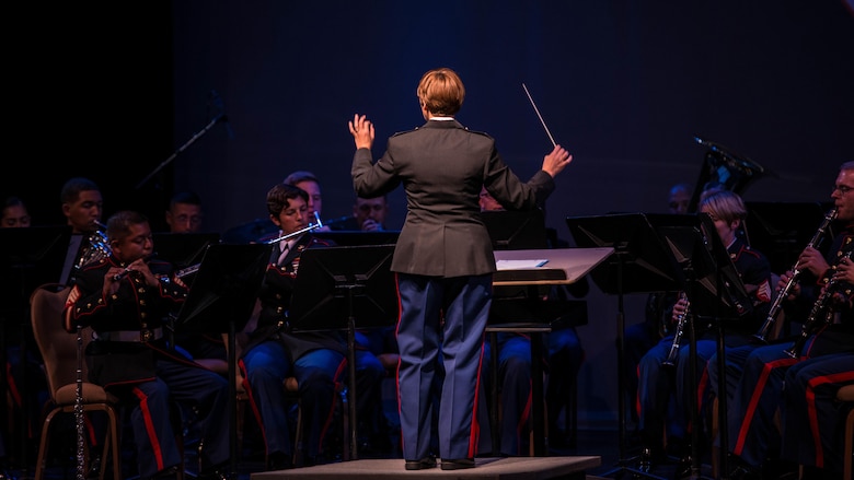 Chief Warrant Officer 3 Stephanie Wire, the officer in charge of the 1st Marine Division Band, conducts the band during the “Honor our Fallen” concert at the Marines Memorial Club and Hotel in San Francisco, Oct. 8, 2015, as part of San Francisco Fleet Week 2015. The concert was an hour-long performance honoring the fallen Marines who have given the ultimate sacrifice during every conflict the Marine Corps has fought in.