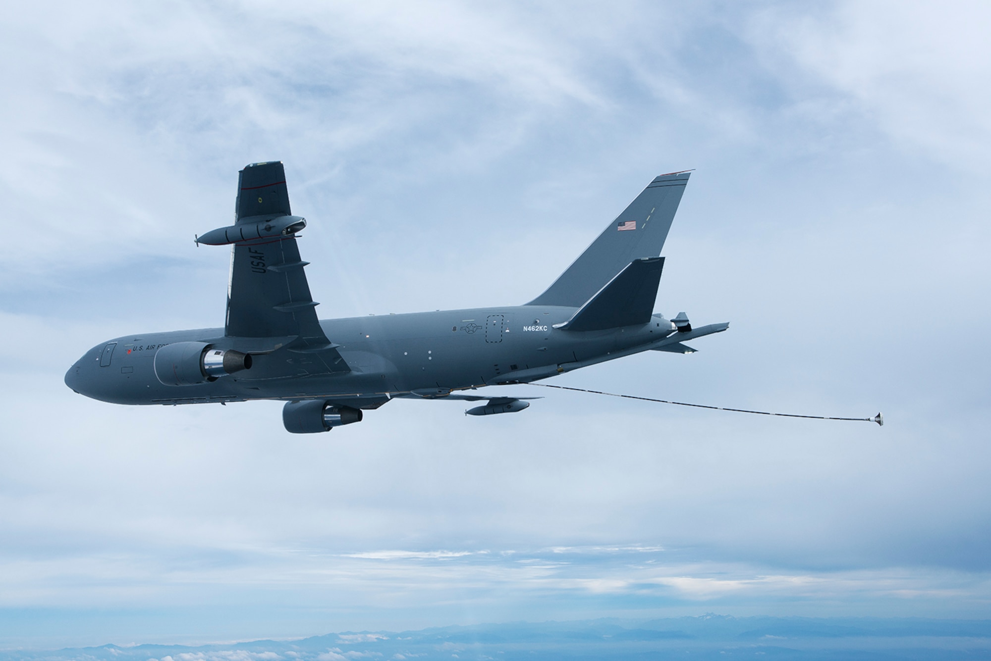 The KC-46A Pegasus deploys the Centerline Drogue System located on the belly of the fuselage on Oct. 8, 2015. The drogue system is used to refuel probe receiver aircraft. (Boeing photo/John D. Parker)
