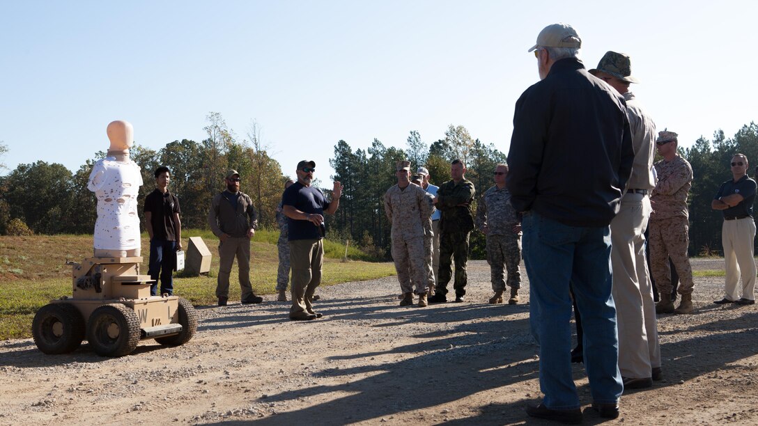 Representatives of numerous government agencies are educated on the robotic human type target at Fort A.P. Hill, Va., Oct. 10, 2015. Robotic targets help to compile data for the Joint Sniper Performance Improvement Methodology Quick Reaction Test. This yearlong test aims to improve the skills of snipers across all United States’ government agencies.
