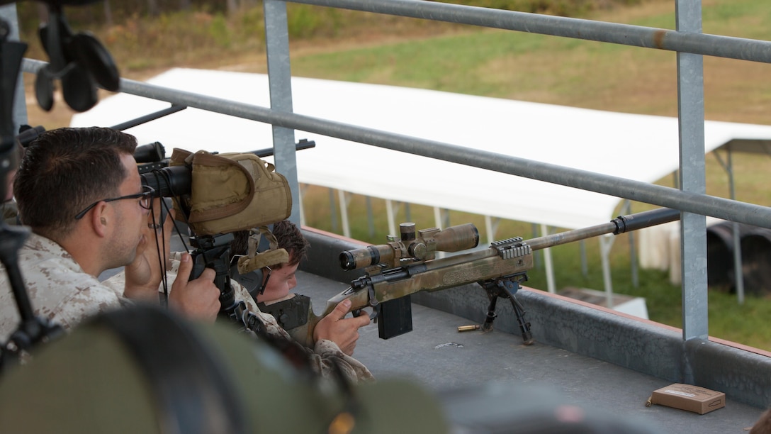 A Marine Corps sniper and his spotter attempt to shoot a robotic moving target at 600 meters at Fort A.P. Hill, Va., Oct. 10, 2015. The data about the shots fired are collected for the Joint Sniper Performance Improvement Methodology Quick Reaction Test. This yearlong test aims to improve the skill of snipers across all United States’ government agencies.
