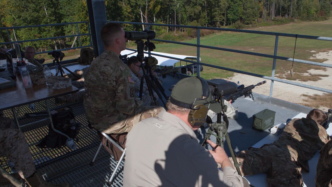 A group of snipers have data on their shots recorded as they fire at robotic moving targets at Fort A.P. Hill, Va., Oct. 10, 2015. These strings of fires are part of the last data to be compiled for the Joint Sniper Performance Improvement Methodology Quick Reaction Test. This yearlong test aims to improve the skills of snipers across all United States’ government agencies.