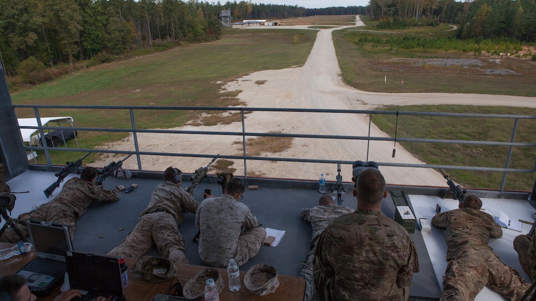A group of snipers have data on their shots recorded as they fire at robotic moving targets at Fort A.P. Hill, Va., Oct. 10, 2015. These strings of fires are part of the last data to be compiled for the Joint Sniper Performance Improvement Methodology Quick Reaction Test. This yearlong test aims to improve the skills of snipers across all United States’ government agencies.