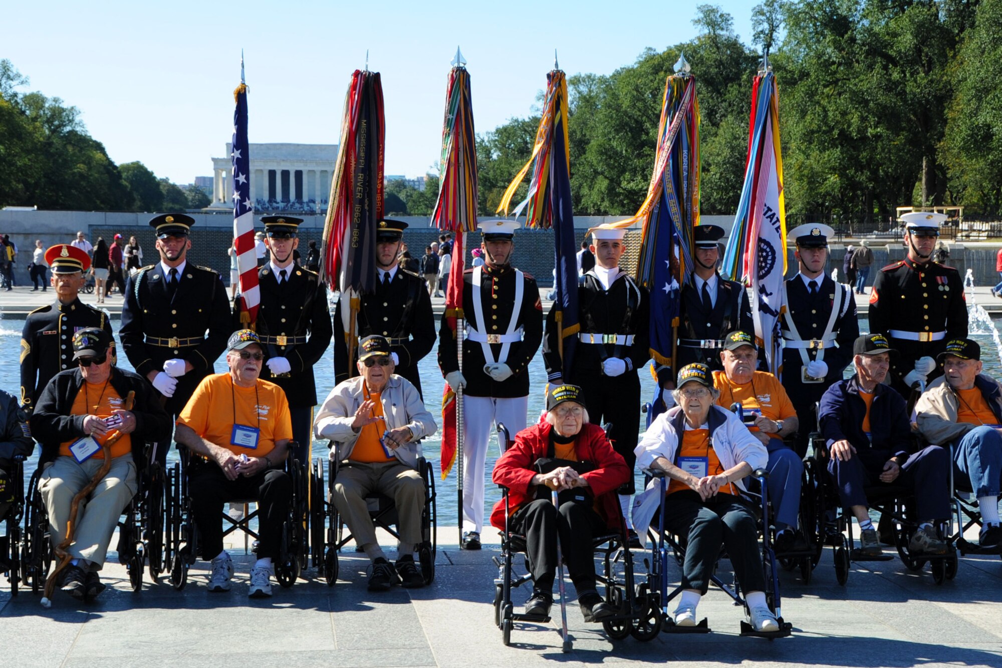 The USAF Honor Guard joins a Joint Service Color Team to pay tribute to World War II veterans from the Tennessee area during a Wreath Ceremony at the National World War II Memorial on Oct. 10. The event was hosted by Honor Flight Tennessee in honor of World War II veterans from the state. Honor Flight Tennessee was founded to recognize World War II veterans by flying them free-of-charge to Washington D.C. for a day of honor, remembrance and celebration. (U.S. Air Force photo/Staff Sgt. Matt Davis)
