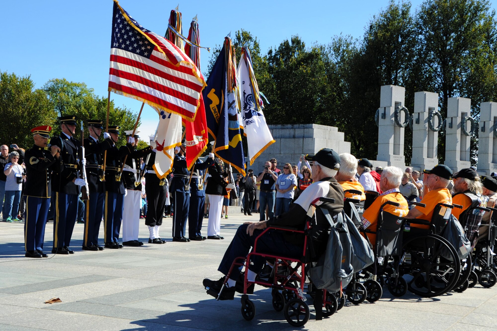 The USAF Honor Guard joins a Joint Service Color Team to pay tribute to World War II veterans from the Tennessee area during a Wreath Ceremony at the National World War II Memorial on Oct. 10. The event was hosted by Honor Flight Tennessee in honor of World War II veterans from the state. Honor Flight Tennessee was founded to recognize World War II veterans by flying them free-of-charge to Washington D.C. for a day of honor, remembrance and celebration. (U.S. Air Force photo/Staff Sgt. Matt Davis)
