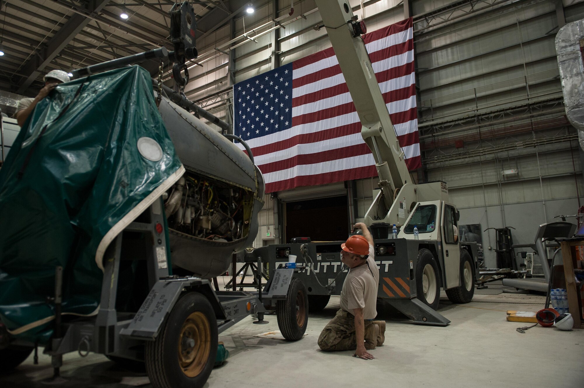 U.S. Airmen assigned to the 455th Expeditionary Maintenance Squadron change an engine out on a C-130J Super Hercules aircraft at Bagram Airfield, Afghanistan, Oct. 1, 2015.  The C-130’s short takeoff and landing capability makes it an optimum fit for Afghanistan’s rugged terrain.  (U.S. Air Force photo by Tech. Sgt. Joseph Swafford/Released)