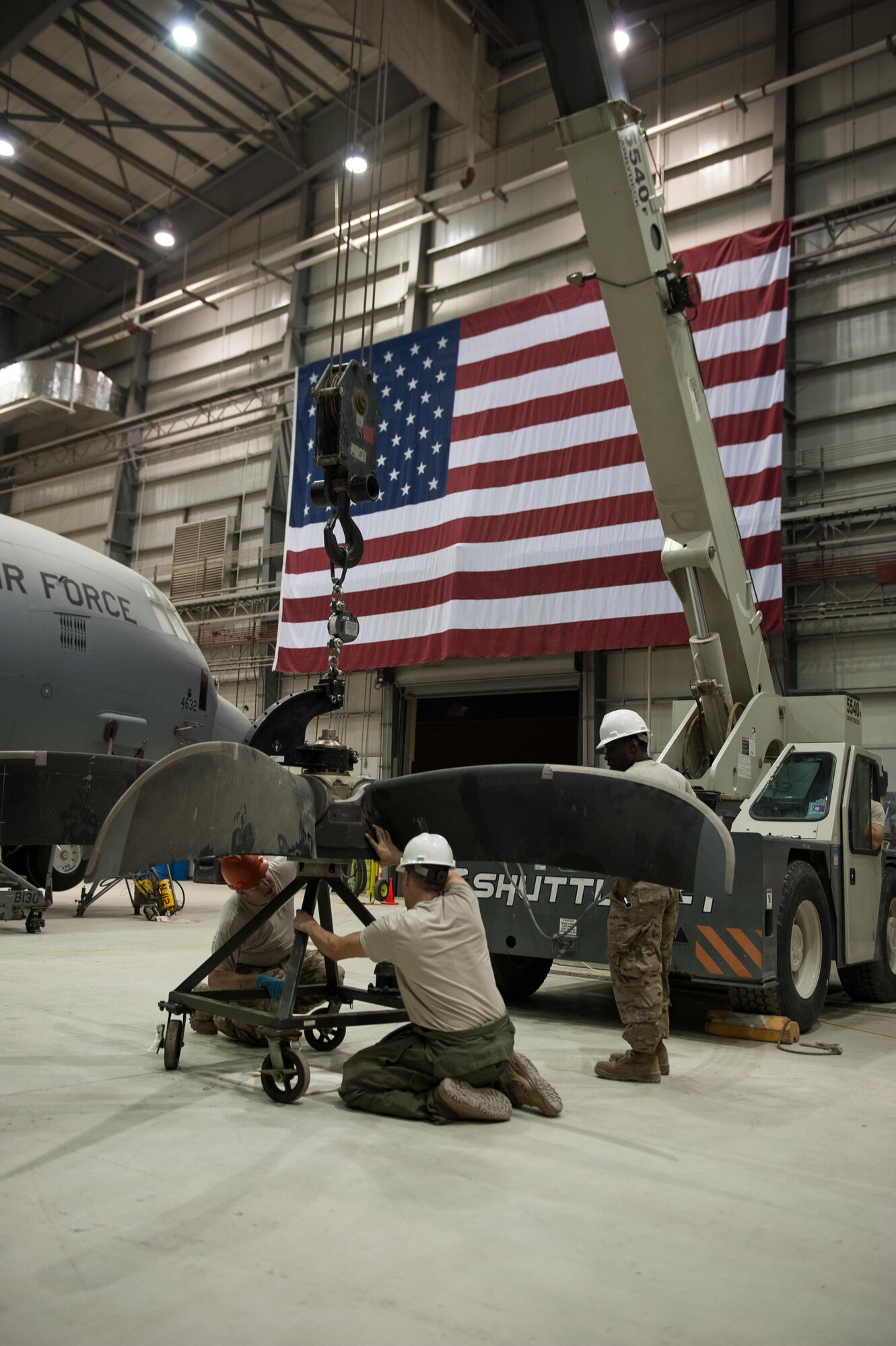 U.S. Airmen assigned to the 455th Expeditionary Maintenance Squadron change an engine out on a C-130J Super Hercules aircraft at Bagram Airfield, Afghanistan, Oct. 1, 2015.  The C-130’s short takeoff and landing capability makes it an optimum fit for Afghanistan’s rugged terrain.  (U.S. Air Force photo by Tech. Sgt. Joseph Swafford/Released)