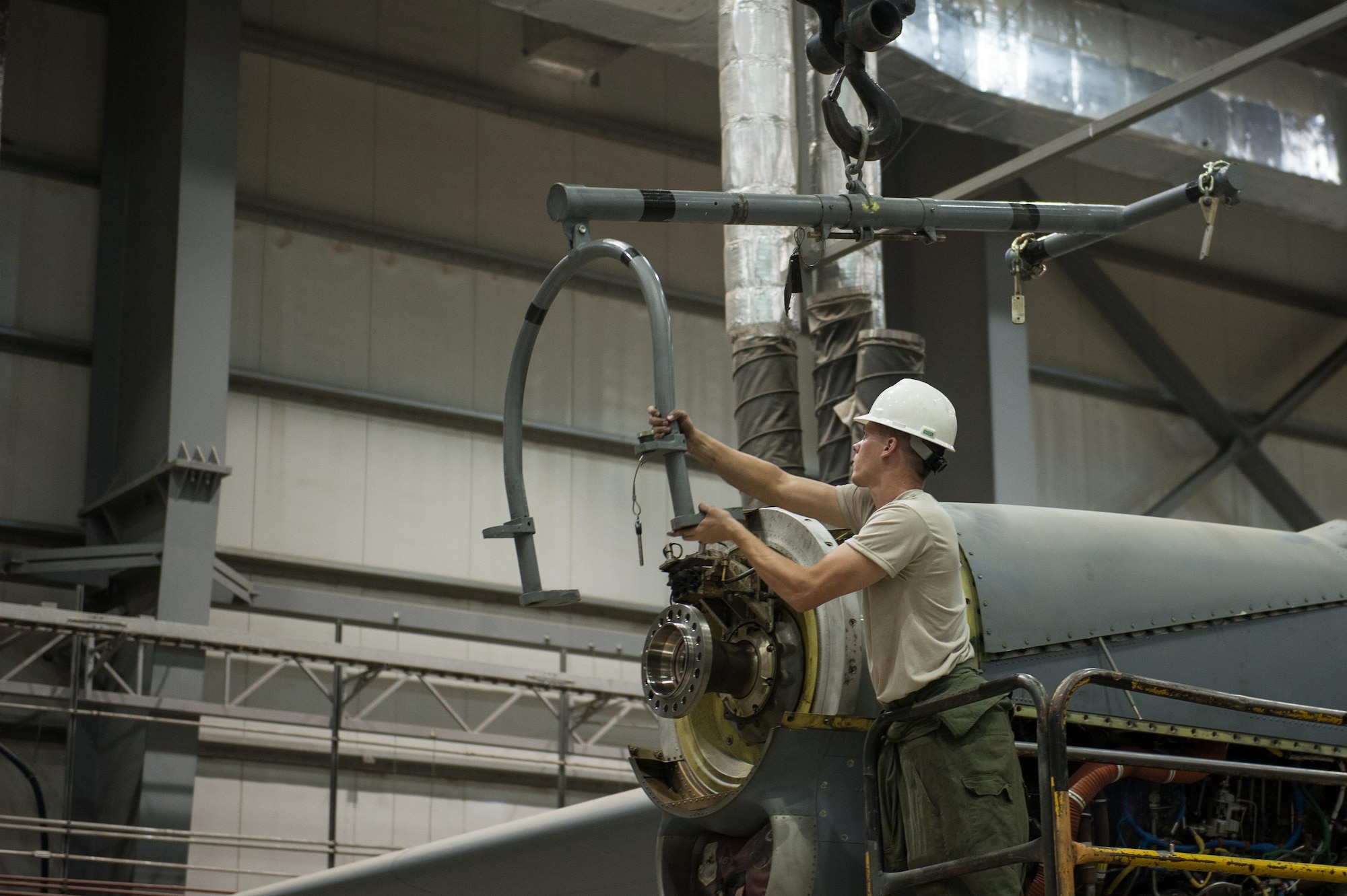 A U.S. Airman assigned to the 455th Expeditionary Maintenance Squadron changes an engine out on a C-130J Super Hercules aircraft at Bagram Airfield, Afghanistan, Oct. 1, 2015.  The C-130’s short takeoff and landing capability makes it an optimum fit for Afghanistan’s rugged terrain.  (U.S. Air Force photo by Tech. Sgt. Joseph Swafford/Released)