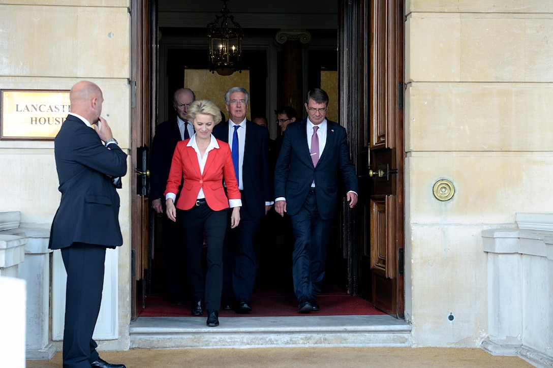 U.S. Defense Secretary Ash Carter, right, British Secretary of State for Defense Michael Fallon, center, and German Minister of Defense Ursula von der Leyen exit Lancaster House in after a tri-lateral meeting, London, England, Oct. 09, 2015. Carter is on a five-day trip to Europe to attend the NATO Defense Ministerial Conference in Brussels and to meet with counterparts in Spain, Italy, and the United Kingdom. DoD photo by U.S. Army Sgt. 1st Class Clydell Kinchen

