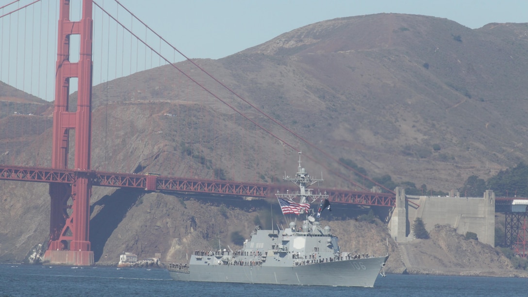 A U.S. Navy ship passes under the Golden Gate Bridge during the parade of ships event as part of San Francisco Fleet Week 2015, Oct. 9. The parade of ships is a traditional part of Fleet Week in which service members and San Francisco natives pay respects to the ships who pass through the harbor. SFFW 15’ is a week-long event that blends a unique training and education program, bringing together key civilian emergency responders and Naval crisis-response forces to exchange best practices on humanitarian assistance disaster relief with particular emphasis on defense support to civil authorities.