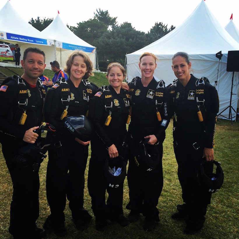 The U.S. Armed Forces Parachuting Team featuring the Army Golden Knights Parachuting Team get ready for their formation dive. The U.S. women won gold while setting the CISM World Record in Formation Sky Diving. From left to right: SFC Scott Janis (Videographer); SFC Laura Davis; SFC Jennifer Davis; SFC Angela Nichols; SFC Dannielle Woosely