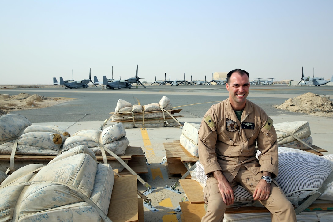 Marine Corps Capt. Paul Keller, a pilot with Marine Medium Tiltrotor Squadron 165, Special Purpose Marine Air Ground Task Force-Crisis Response-Central Command, assesses the firmness of the expeditionary safety equipment that he flawlessly landed an MV-22 Osprey on after the aircraft experienced a technical malfunction with its landing gear, Oct. 9, 2015 in Southwest Asia.