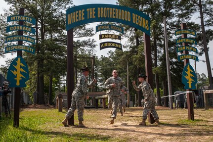 Staff Sgt. Dee McMurdo, representing the 84th Training Command, crosses the finish at the "Little Nasty Nick" obstacle course at the 2015 U.S. Army Reserve Best Warrior Competition at Fort Bragg, N.C., May 6. This year's Army Reserve Best Warrior Competition will determine the top noncommissioned officer and junior enlisted Soldier who will represent the Army Reserve in the Department of the Army Best Warrior competition in October at Fort Lee, Va. (U.S. Army photo by Timothy L. Hale/Released)