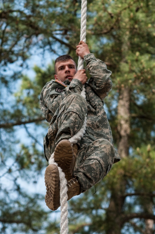 Spc. Ian Hagan, representing the 416th Theater Engineer Command, completes an obstacle at the "Little Nasty Nick" obstacle course at the 2015 U.S. Army Reserve Best Warrior Competition at Fort Bragg, N.C., May 6. This year's Army Reserve Best Warrior Competition will determine the top noncommissioned officer and junior enlisted Soldier who will represent the Army Reserve in the Dept. of the Army Best Warrior competition in Oct. at Fort Lee, Va. (U.S. Army photo by Timothy L. Hale/Released)