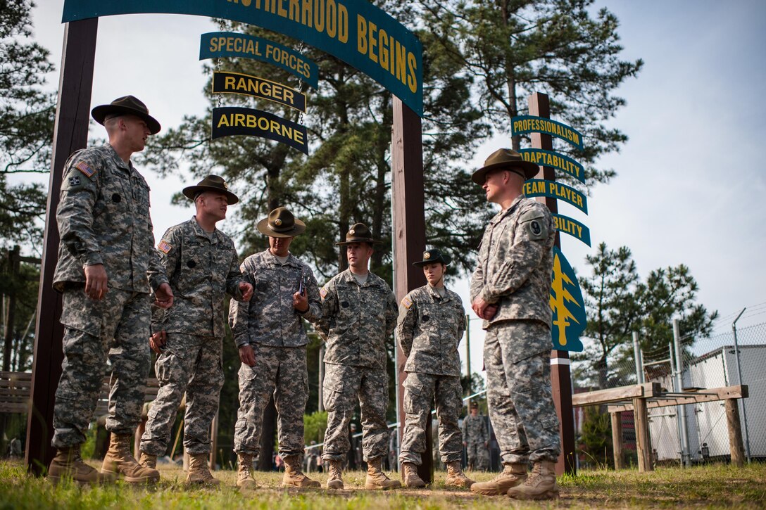 U.S. Army Reserve drill sergeants from 2nd Battalion, 397th Regiment, 3rd Brigade, 95th Training Division (Initial Entry Training), prepare to score the "Little Nasty Nick" obstacle course at the 2015 U.S. Army Reserve Best Warrior Competition at Fort  Bragg, N.C., May 6. This year's Army Reserve Best Warrior Competition will determine the top noncommissioned officer and junior enlisted Soldier who will represent the Army Reserve in the Department of the Army Best Warrior competition in October at Fort Lee, Va. (U.S. Army photo by Timothy L. Hale/Released)