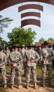 U.S. Army Reserve drill sergeants from 2nd Battalion, 397th Regiment, 3rd Brigade, 95th Training Division (Initial Entry Training), listen to Maj. Gen. David Conboy, U.S. Army Reserve Command deputy commanding general for operations, address U.S. Army Reserve Best Warrior competitors at the "Little Nasty Nick" obstacle course during the 2015 U.S. Army Reserve Best Warrior Competition at Fort Bragg, N.C., May 6. This year's Army Reserve Best Warrior Competition will determine the top noncommissioned officer and junior enlisted Soldier who will represent the Army Reserve in the Department of the Army Best Warrior competition in October at Fort Lee, Va. (U.S. Army photo by Timothy L. Hale/Released)