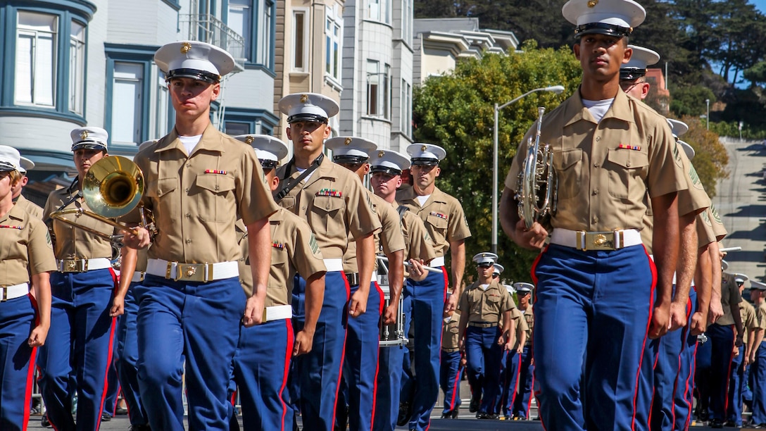 Marines with the 1st Marine Division Band march past the Coit Tower during the Italian heritage parade on Oct. 11., as part of San Francisco Fleet Week 2015. SFFW '15 is a week-long event that blends a unique training and education program, bringing together key civilian emergency responders and Naval crisis-response forces to exchange best practices on humanitarian assistance disaster relief with particular emphasis on defense support to civil authorities.