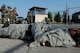 An Airman waits to be taken to the hospital after being treated as a result from a missile fire exercise as part of Beverly Pack 16-1 at Kunsan Air Base, Republic of Korea, Oct. 6, 2015. The exercise tested the efficiency and response time for Airmen performing self-aid and buddy care. (U.S. Air Force photo by Senior Airman Ashley L. Gardner/Released)



