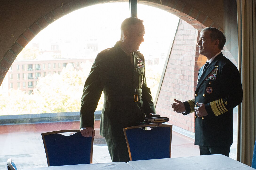 U.S. Marine Corps Gen. Joseph F. Dunford Jr., left, chairman of the Joint Chiefs of Staff, and U.S. Navy Adm. Harry Harris Jr., commander of U.S. Pacific Command, talk during the Australia-United States Ministerial Consultations in Boston, Oct. 12, 2015. Known as the AUSMIN, the meeting is the principal forum for bilateral consultations between Australia and the United States. DoD photo by D. Myles Cullen
