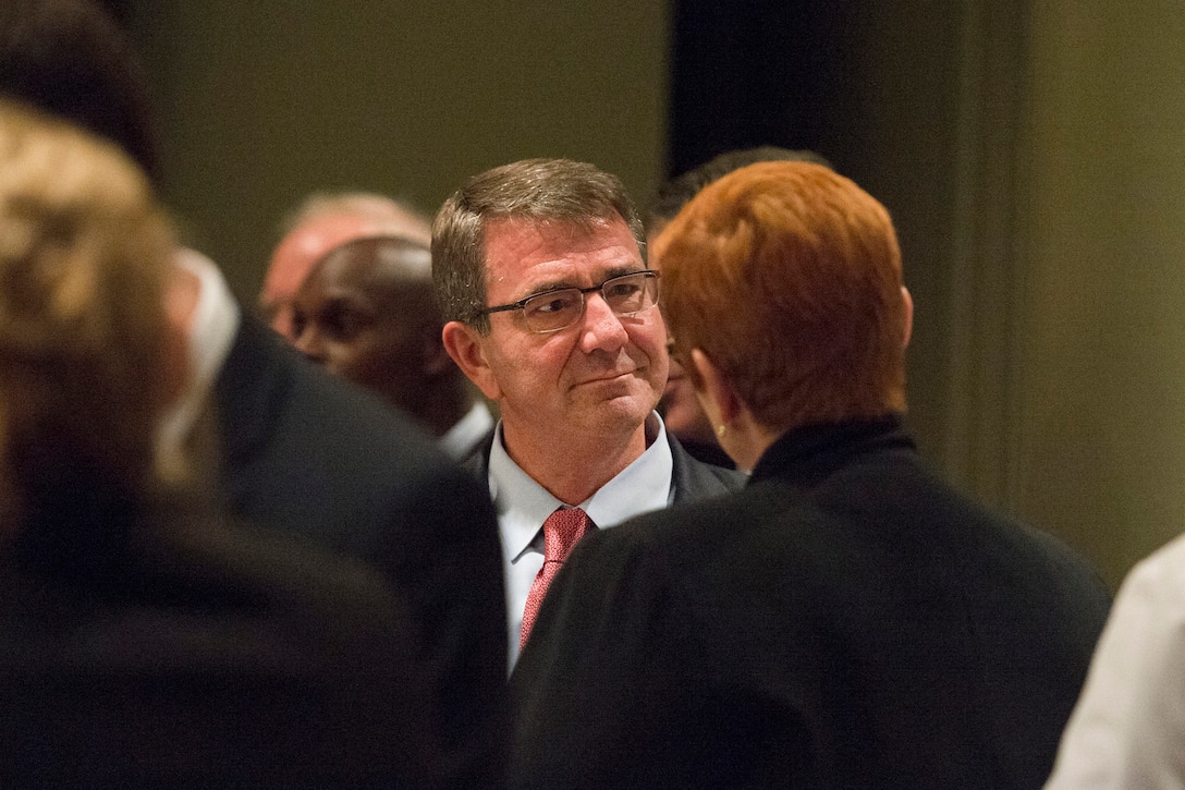 U.S. Defense Secretary Ash Carter speaks with Australian Defense Minister Marise Payne during the Australia–United States Ministerial Consultations reception and dinner in Boston, Oct. 12, 2015. The two leaders met earlier to discuss matters of mutual importance. DoD photo by Air Force Senior Master Sgt. Adrian Cadiz