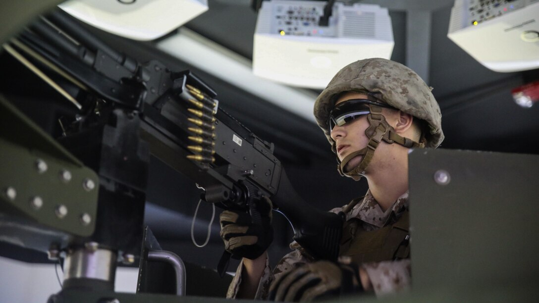 Lance Cpl. Luis Muniz, a motor transport operator with Transportation Support Co., Combat Logistics Battalion 2, mans an M240G medium machine gun during simulated High Mobility Multipurpose Wheeled Vehicle convoy training at Camp Lejeune, N.C., Oct. 7, 2015. Marines with the unit are undergoing Convoy Leader’s Course in preparation for an Integrated Training Exercise in Twentynine Palms, Calif., later this month.