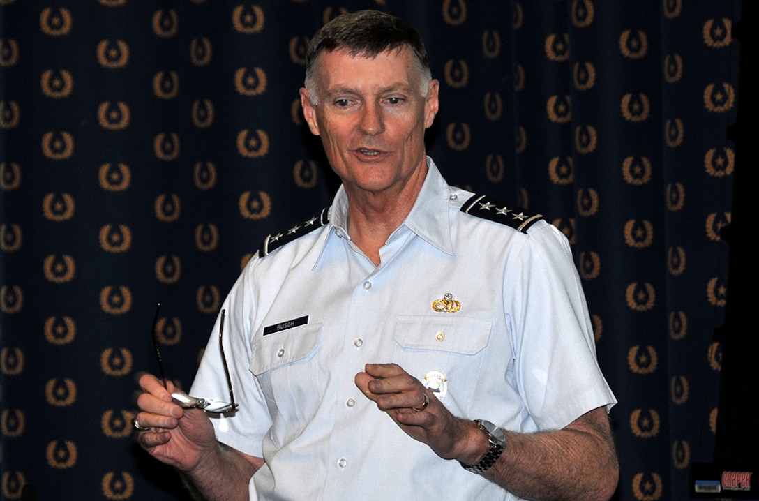 Defense Logistics Agency Director Lt. Gen. Andy Busch addresses representatives of the aviation industry at a Captains of Industry event Aug. 4.