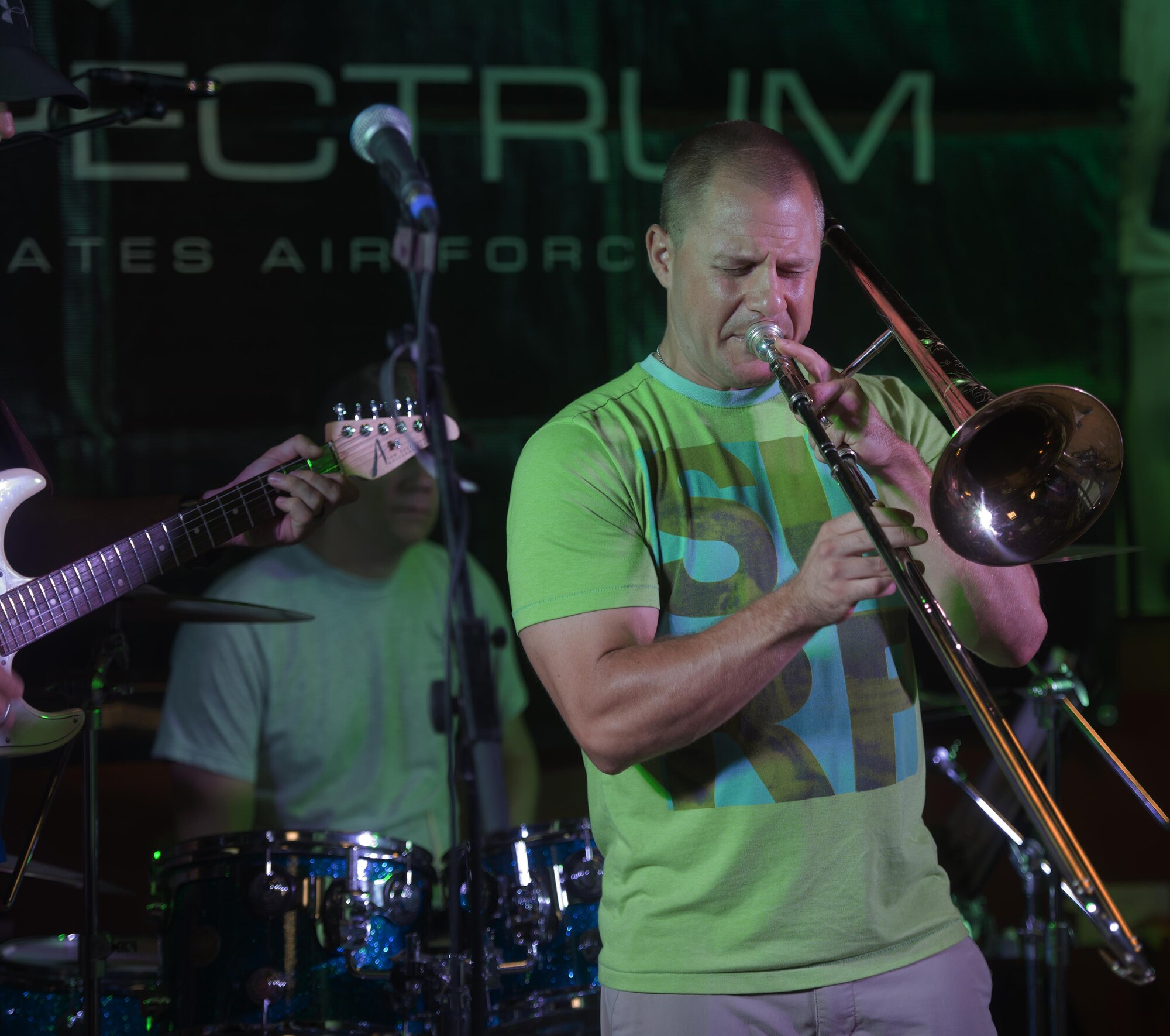 Staff Sgt. Trent Lockheart, a trombone player with the U.S. Air Force’s Central Command Band, Full Spectrum, performs at the Fox Sports Lounge at Al Udeid Air Base, Qatar Oct. 13, 2015. The performance, which featured hit songs “Uptown Funk,” “Beat It” and “Superstitious” was the band’s last before the group kicks-off a 16-day tour. (U.S. Air Force Photo/Tech. Sgt. James Hodgman)