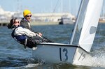 Members of the U.S. Naval Academy's varsity offshore sailing team steer a Club FJ sailboat in Maryland's Severn River. DLA recently helped the academy donate 21 of the small watercraft to the SUNY Maritime Academy in New York City. 