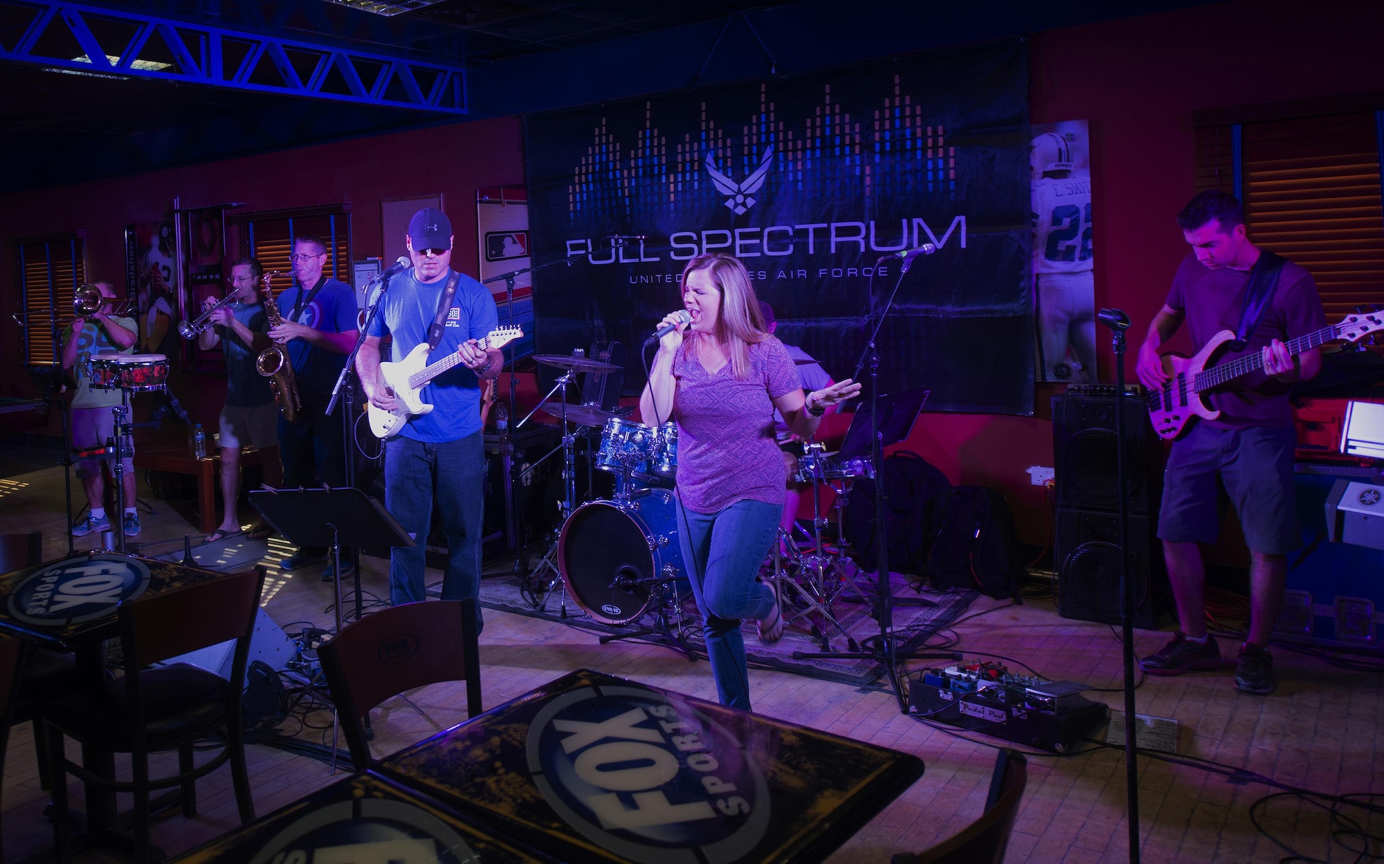 The U.S. Air Force’s Central Command Band, Full Spectrum, performs at the Fox Sports Lounge at Al Udeid Air Base, Qatar Oct. 13, 2015. The performance, which featured hit songs “Uptown Funk,” “Beat It,” and “Superstitious” was the band’s last before the group kicks off a 16-day tour. (U.S. Air Force Photo/Tech. Sgt. James Hodgman) 
