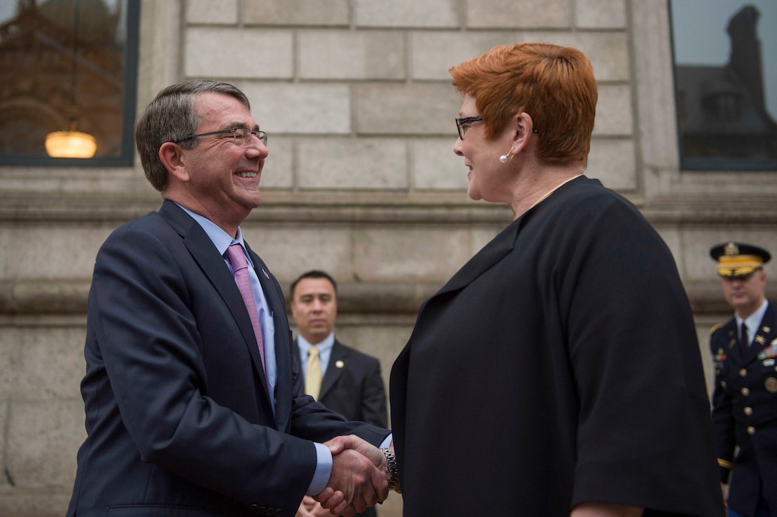 U.S. Defense Secretary Ash Carter exchanges greetings with Australian Defense Minister Marise Payne as she arrives at the Boston Public Library during the Australia-U.S. Ministerial Consultations in Boston, Oct. 13, 2015. DoD photo by Air Force Senior Master Sgt. Adrian Cadiz