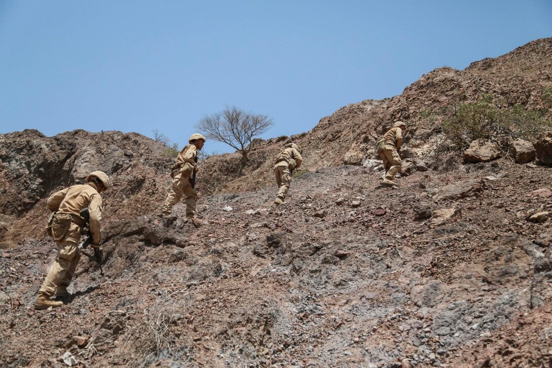 ARTA TRAINING RANGE, Djibouti (Oct. 4, 2015) U.S. Marines with the 15th Marine Expeditionary Unit practice patrolling techniques during a desert survival and tactics course with the French 5th Overseas Combined Arms Regiment (RIAOM). Elements of the 15th MEU trained with the 5th RIAOM in Djibouti in order to improve interoperability between the MEU and the French military. (U.S. Marine Corps photo by Sgt. Steve H. Lopez/Released)
