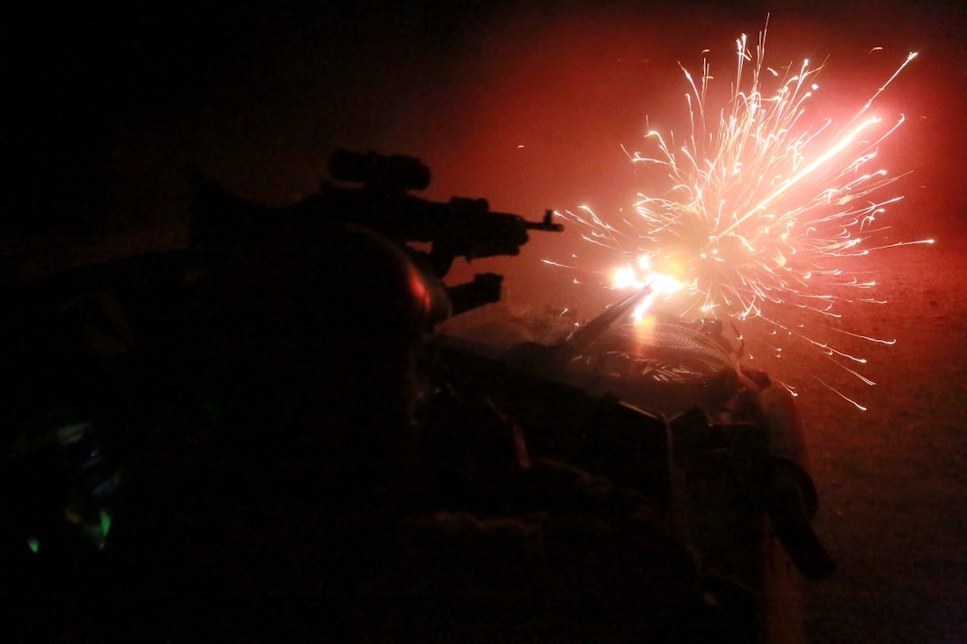 ARTA TRAINING RANGE, Djibouti (Oct. 5, 2015) U.S. Marines with the 15th Marine Expeditionary Unit engage targets from a Light Armored Vehicle (LAV-25) with an M242 automatic chain gun on a night live-fire range during a desert survival and tactics course. Elements of the 15th MEU are training with the 5th Overseas Combined Arms Regiment (RIAOM) in Djibouti in order to improve interoperability between the MEU and the French military. (U.S. Marine Corps photo by Sgt. Steve H. Lopez/Released)