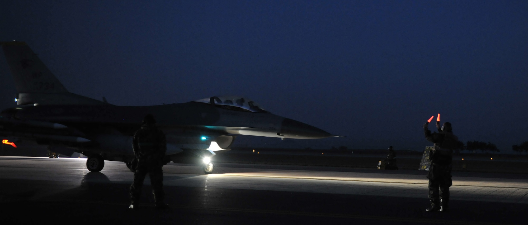A U.S. Air Force F-16 Fighting Falcon from the 8th Fighter Wing participates in an elephant walk formation during an exercise at Kunsan Air Base, Republic of Korea Oct. 7 2015. The exercise demonstrated the capability of maintainers to prepare aircraft for wartime missions. (U.S. Air Force photo by Senior Airman Dustin M. King/Released)