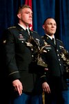 Spc. Cruser Barnes, left, from the Hawaii Army National Guard’s Troop A, 1st Squadron, 299th Cavalry Regiment, stands next to Army Staff Sgt. Kevin Simpson, assigned to the U.S. Army Band, Military District of Washington, during the all-Army Best Warrior Competition awards luncheon at the Walter E. Washington Convention Center in Washington, D.C., Oct. 12, 2015. Barnes was the first runner-up in the Soldier category of the competition after winning the Army National Guard level competition earlier in the year. 
