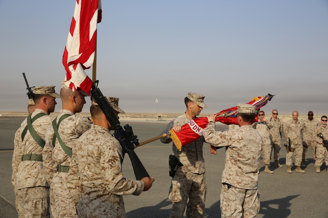 U.S. Marine Lt. Col. Ryan Sheehy, the commanding officer of Marine Medium Tiltrotor Squadron 165 (VMM-165) and Sgt. Maj. Sean Greenleaf case their colors during a Transfer of Authority ceremony, in an undisclosed location, Oct. 13, 2015. The ceremony signifies the transfer of responsibilities from one squadron to another as the Special Purpose Marine Air Ground Task Force-Crisis Response-Central Command MV-22 assault support squadron. (U.S. Marine Corps photo by Cpl. John Baker)