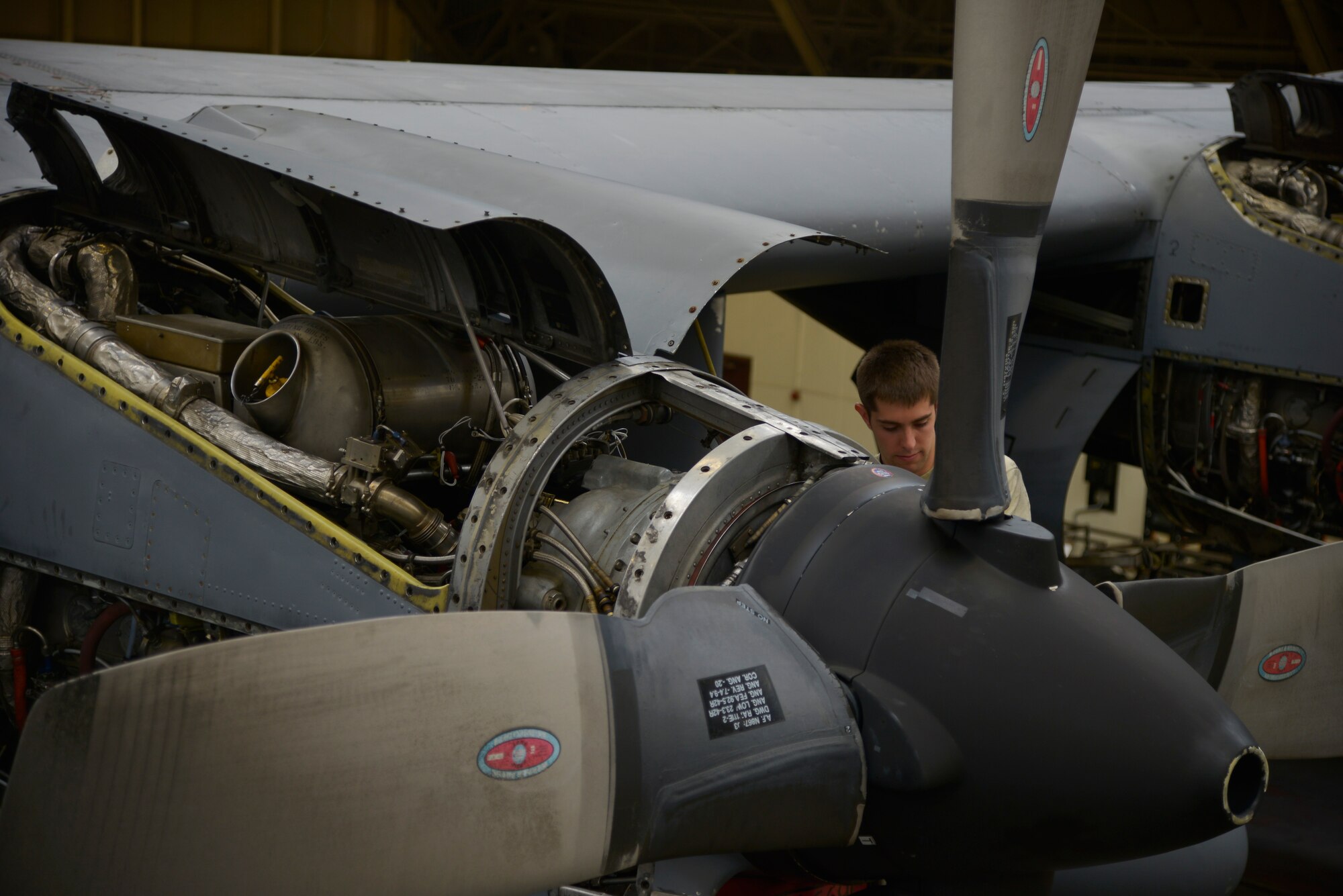 Airman 1st Class Jacob Lay, 374th Maintenance Squadron airspace propulsion journeyman, takes propeller panels off a C-130 Hercules at Yokota Air Base, Japan, Oct. 6, 2015. The new paperless process has saved approximately 600 man-hours per isochronal inspection. (U.S. Air Force photo by Senior Airman David Owsianka/Released)
