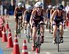 U.S. Army 2nd Lt. Justine Emge (right) and Air Force Maj. Judith Coyle race the 40-kilometer cycling leg of the women's triathlon in downtown Pohang, South Korea during the CISM World Games Oct. 10, 2015. Coyle earned bronze for the USA with an overall time of two hours, 15 minutes and 27.69 seconds in the triathlon. (U.S. Armed Forces Sports photo by Gary Sheftick)