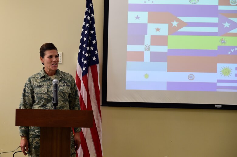Chief Master Sgt. Ruth Flores, Air Reserve Personnel Center command chief, speaks about her experiences in the Air Force during the Hispanic Heritage food tasting event Oct. 13, 2015, at the chapel on Buckley Air Force Base, Colo. The event gave Team Buckley a taste of Hispanic heritage, culture and unique food.  The observance month was initiated by President Lyndon Johnson who declared Hispanic Heritage week in 1968, and was later extended to the entire month by President Ronald Regan twenty years later. (U.S. Air Force Photo by Staff Sgt. Stephany Richards)