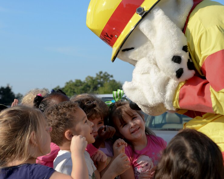 Sparky the Fire Dog visits children during National Fire Prevention Week at the Child Development Center on Barksdale Air Force Base, La., Oct. 7, 2015. This year’s theme was “Hear the Beep Where You Sleep.” (U.S. Air Force photo/Senior Airman Jannelle Dickey)