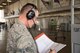 Airman 1st Class Krystian Zyszczynski, 364th Training Squadron hydraulic systems student, reviews the progress checklist during hands-on training with a F-16 flight control simulator Oct. 8, 2015, at Sheppard Air Force Base, Texas. Hydraulic technicians practice how the different gears work in sync to move different flight controls anytime a part is changed in the field. (U.S. Air Force photo by Danny Webb)
