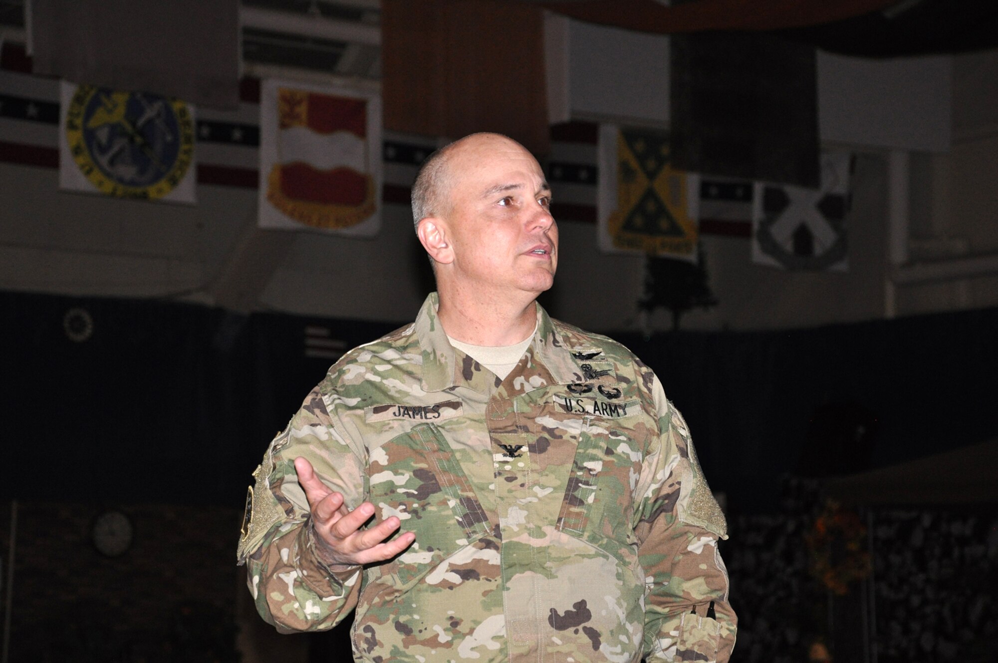 FORT CARSON, Colo. -- Col. Thomas James, 1st Space Brigade commander, U.S. Army Space and Missile Defense Command/Army Forces Strategic Command, speaks to his Soldiers and civilians during a State of the Brigade at the Special Events Center here Oct. 2, 2015. (Photo by Dottie White)