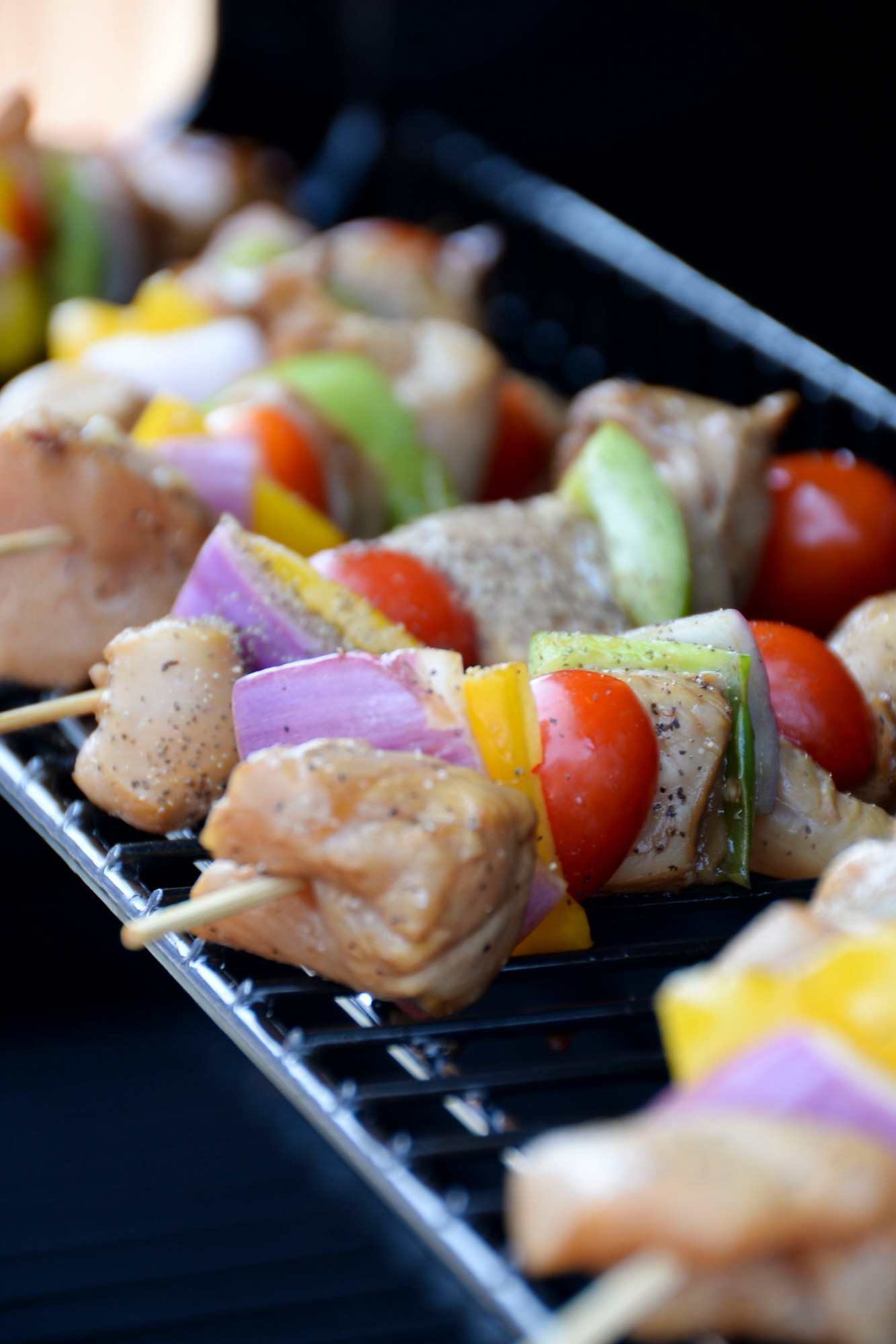 Chicken kabobs cook on the grill during the Global Strike Challenge Chef Competition, Oct. 7, 2015. Three Airmen were selected from each base and were required to present an entrée and dessert using chicken and green apples. (U.S. Air Force photo/Senior Airman Amanda Morris)