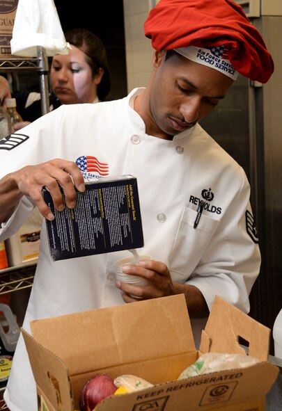 Staff Sgt. Justin Reynolds, 341st Force Support Squadron fitness center shift supervisor from Malmstrom Air Force Base, Mont., collects ingredients for the Global Strike Chef Competition at Barksdale Air Force Base, La., Oct. 7, 2015. Airmen from bases in Air Force Global Strike Command traveled to Barksdale for the first GSC Chef Competition. Three of the best Airmen were selected from each of the seven bases to participate. The winning team will be announced Oct. 21. (U.S. Air Force photo/Senior Airman Amanda Morris)