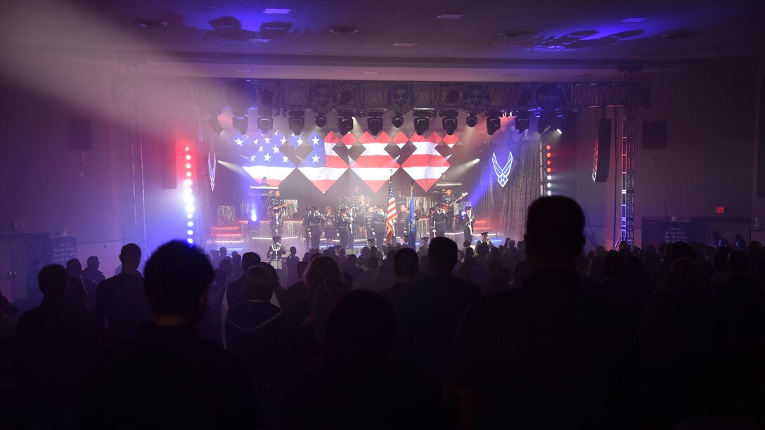 Tops in Blue members perform the National Anthem at the Joint Base Andrews’, Md., base theater, October 2, 2015. Tops in Blue serves as an expeditionary entertainment unit to provide entertainment from within Air Force resources for the Air Force family, with priority to Air Force personnel stationed world-wide at remote and deployed locations. (U.S. Air Force photo/ Airman 1st Class J.D. Maidens/ released)
