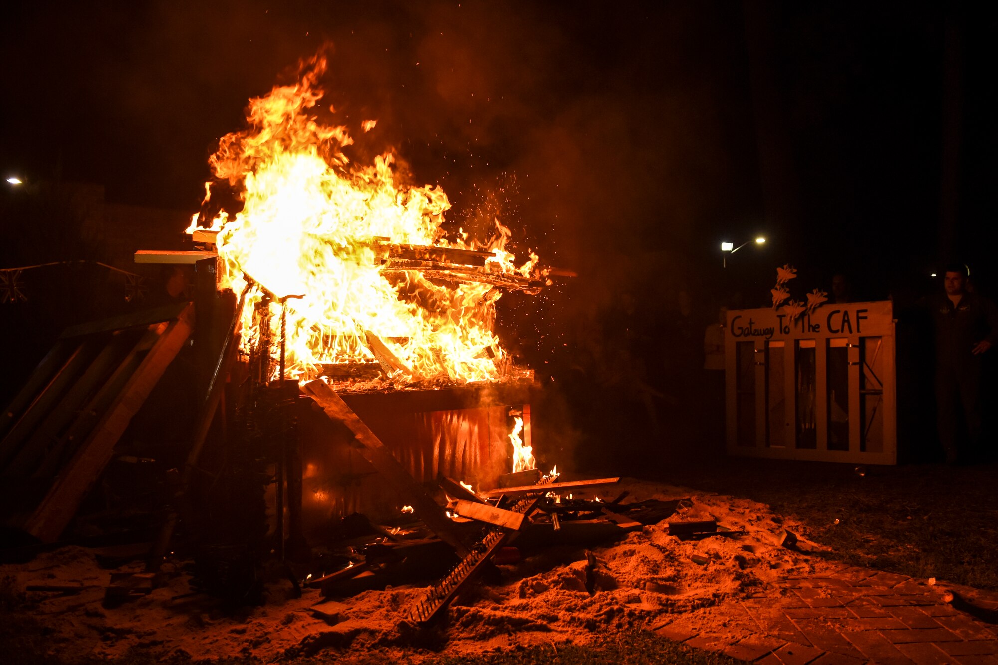 A piano is burned in memoriam of the Battle of Britain, Oct. 9, 2015, at Seymour Johnson Air Force Base, North Carolina. Legend tells of a Royal Air Force pilot and pianist who played during the Battle of Britain. During a mission, the pilot was killed and his comrades decided no one else would play his piano, so they burned it in his memory. This year marks the 75th Anniversary of the Battle of Britain, an event the 4th Fighter Wing traces its heritage to.  (U.S. Air Force photo/Airman Shawna L. Keyes)