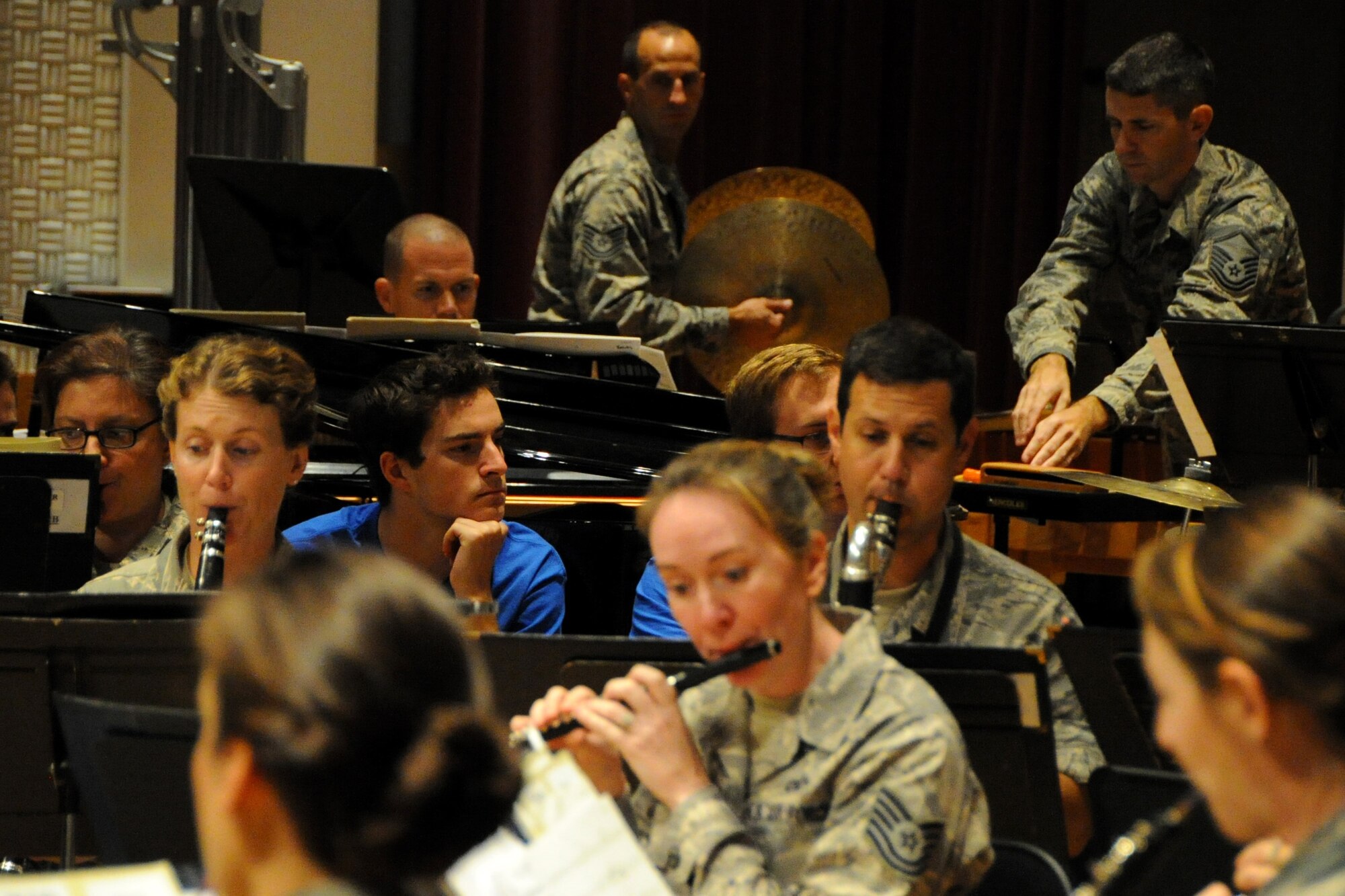 Students from Duke University watch the U.S. Air Force Concert Band rehearse at Joint Base Anacostia-Bolling, Washington D.C., Oct. 13, 2015. The members of Duke University’s Wind Symphony visited the U.S. Air Force Band today for an immersion in music and Air Force culture. The students attended Masterclass sessions led by performers from the Band to further develop mastery of their instruments before watching the Concert Band’s final rehearsal before their fall tour. (U.S. Air Force photo/Staff Sgt. Matt Davis)